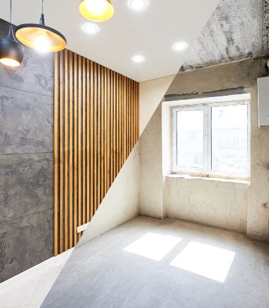 a room with a wood wall and a window